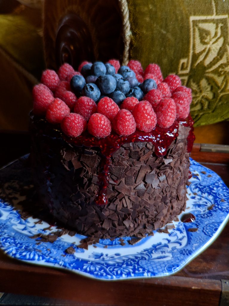 Vegan chocolate cake with vegan chocolate mousse. Photo by Daria Rein.