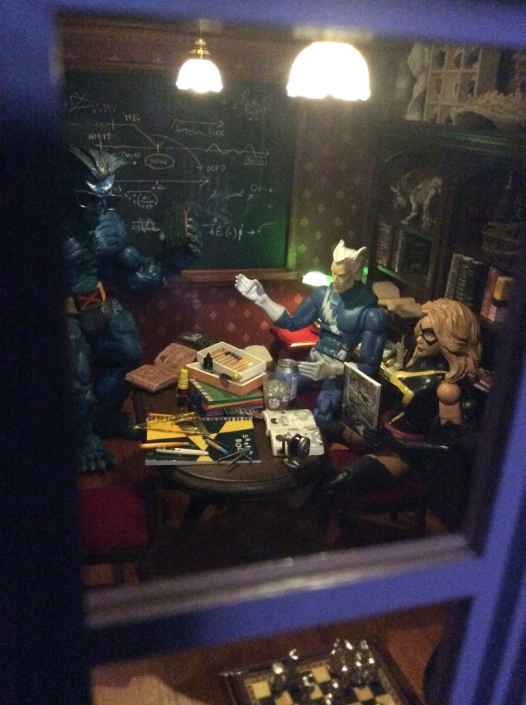 X Men dollhouse library through window by Suzanne Forbes July 18 2019